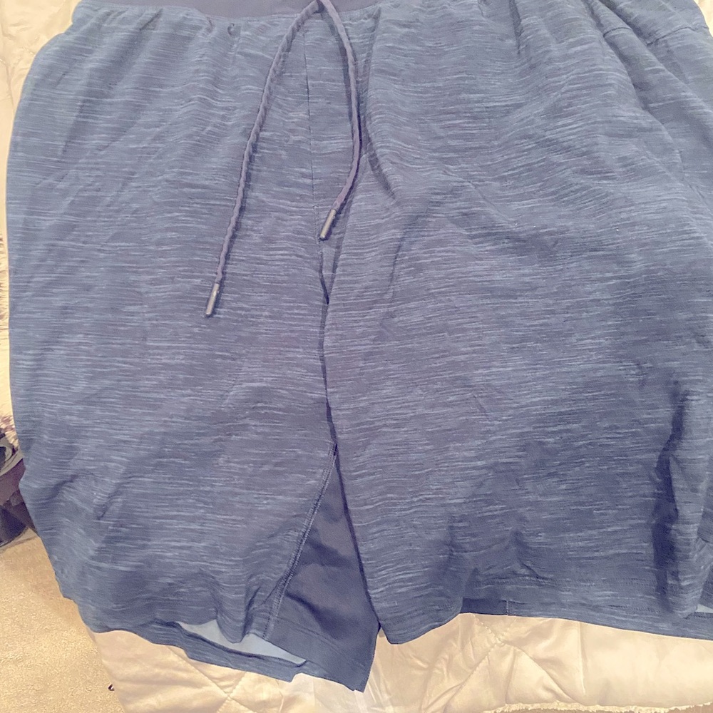 Lululemon mens shirts size large.  Barely used.  Bluish color.